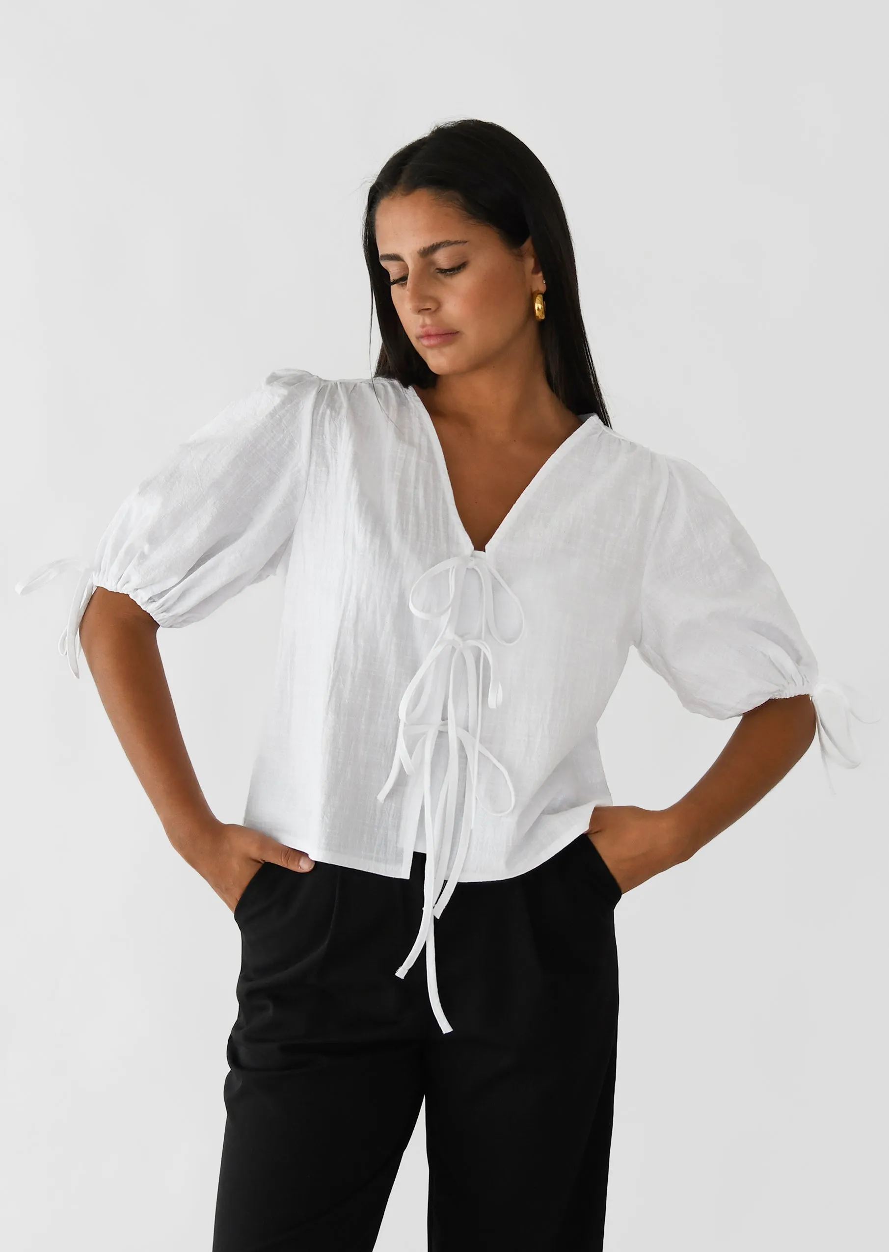 Blouse manches bouffantes avec noeuds