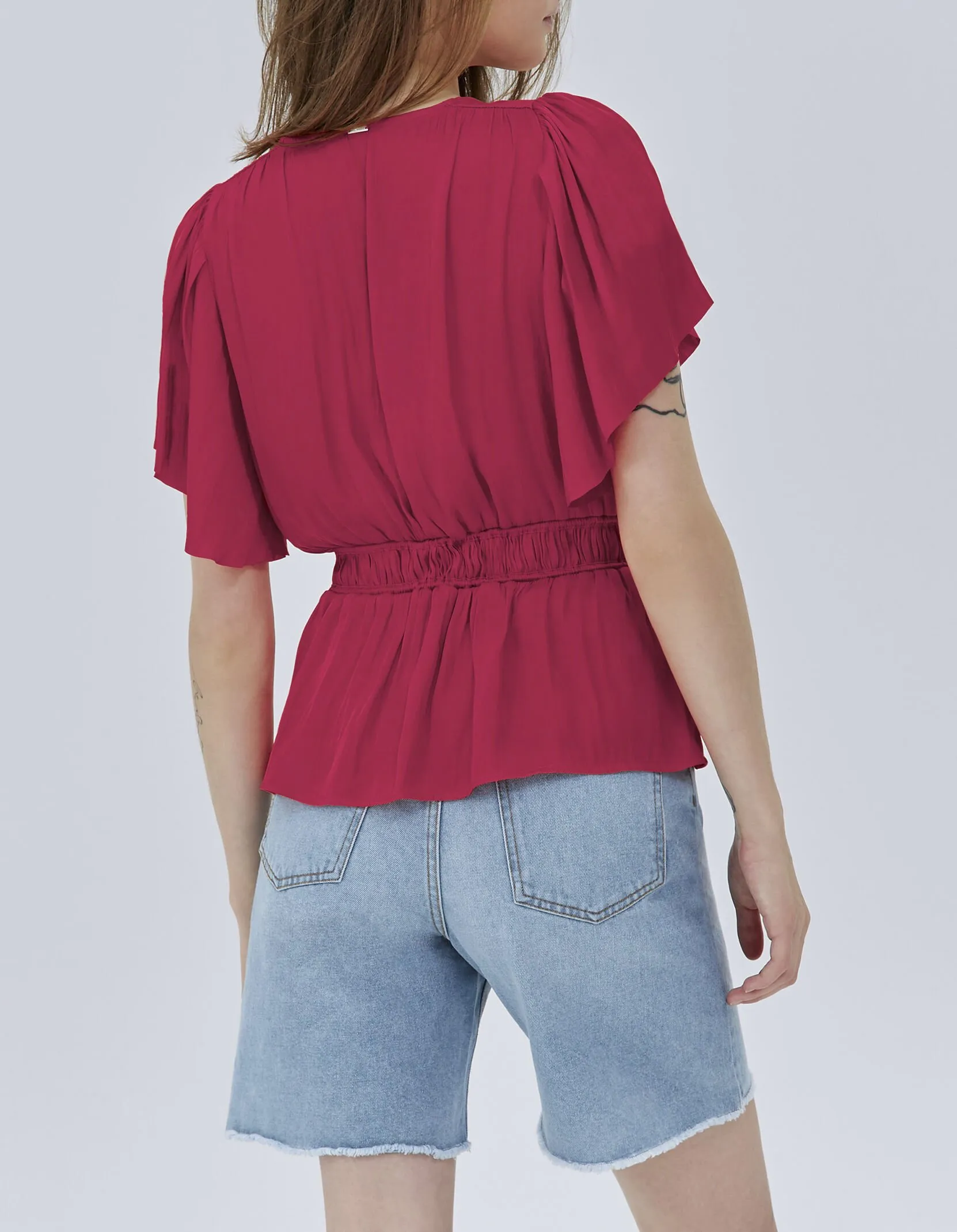 Blouse peplum fushia acidulé femme