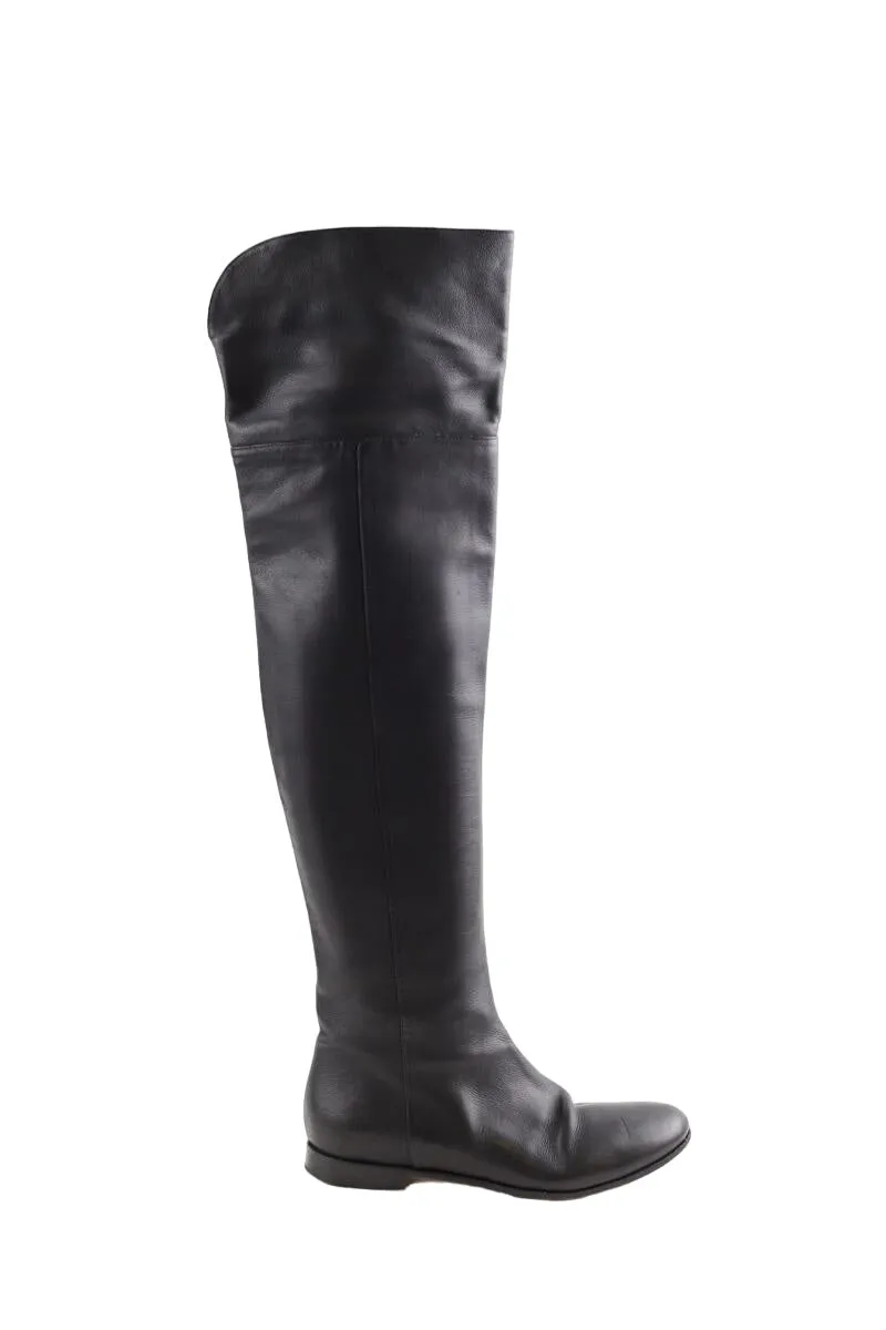 Bottes en cuir  Jimmy Choo noir. Matière principale cuir. Taille 38.