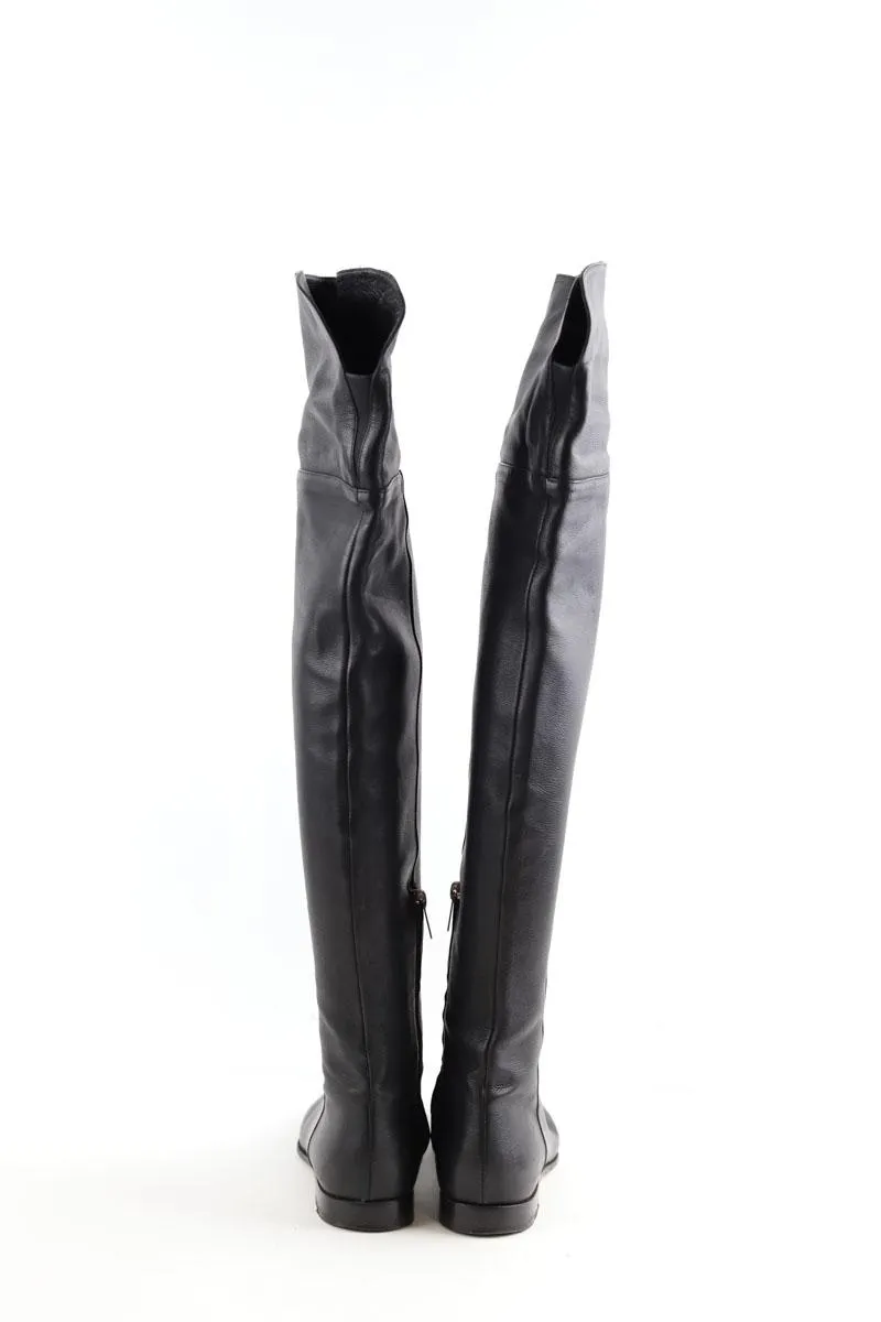 Bottes en cuir  Jimmy Choo noir. Matière principale cuir. Taille 38.