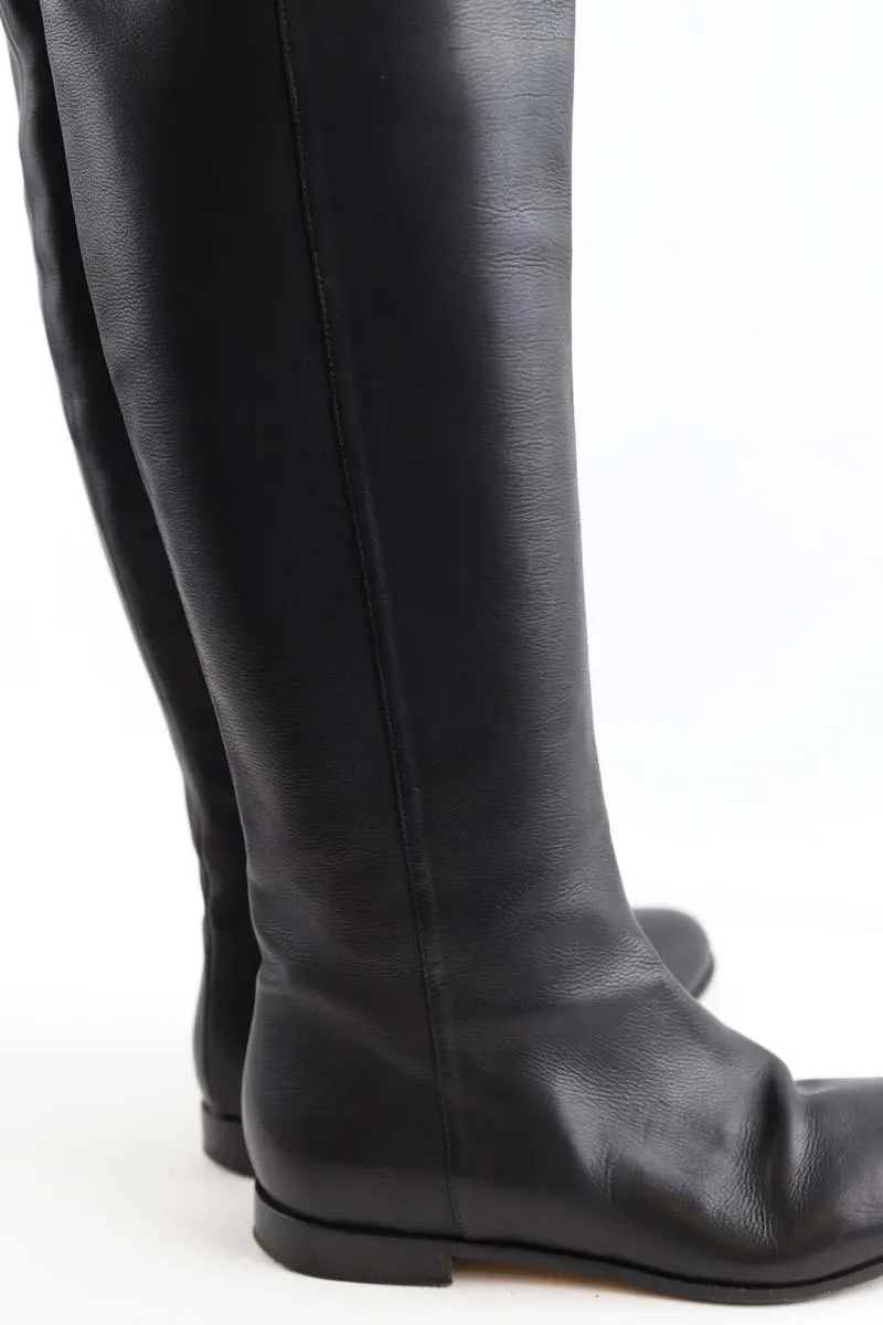 Bottes en cuir  Jimmy Choo noir. Matière principale cuir. Taille 38.