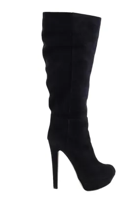 Bottes en daim  Sergio Rossi noir. Matière principale daim. Taille 39.