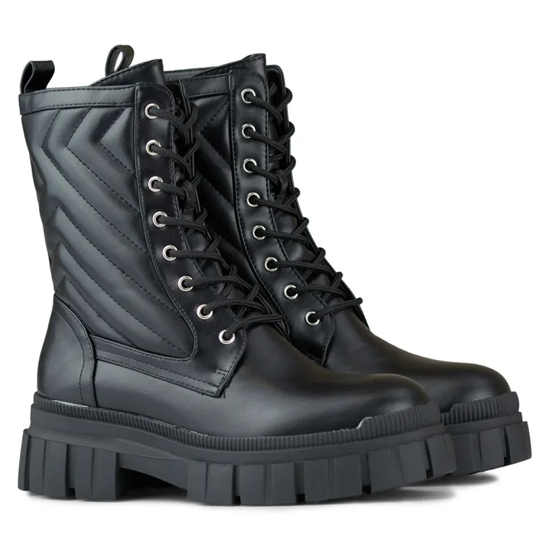 Bottines workwear femme noires à lacets et tige décorative le noir