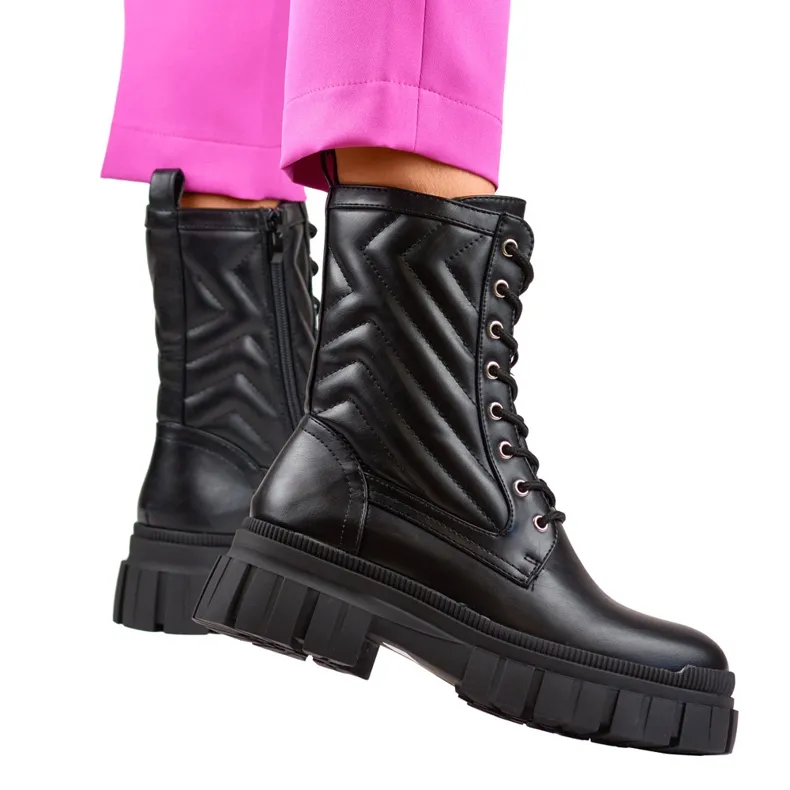 Bottines workwear femme noires à lacets et tige décorative le noir