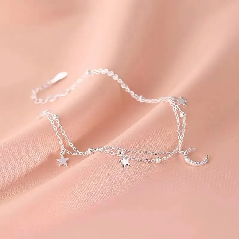 Bracelet double couche avec pendentif étoiles et lune pour femme