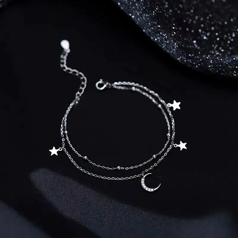 Bracelet double couche avec pendentif étoiles et lune pour femme