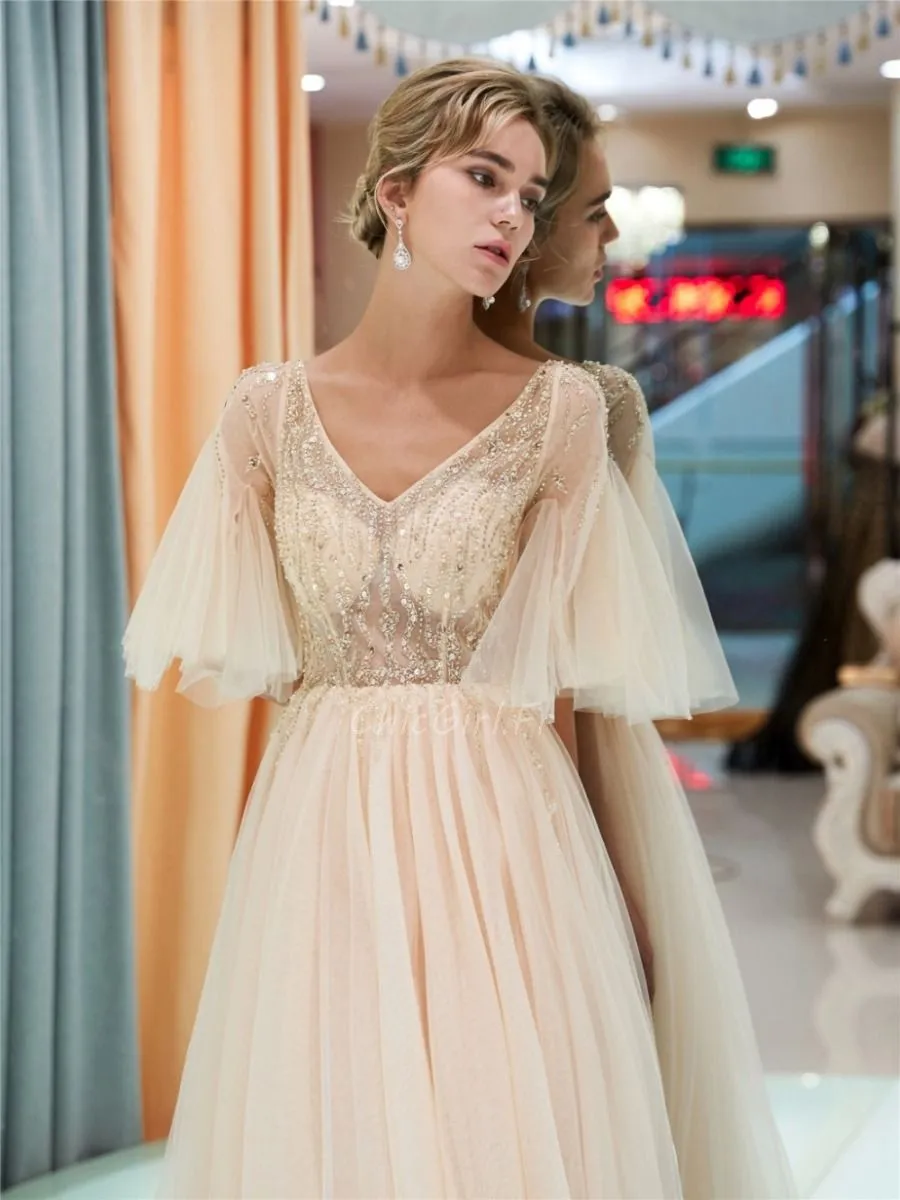 Robe De Bal Princesse Longue Champagne Tulle Perle Manche Volantée Haut Transparent